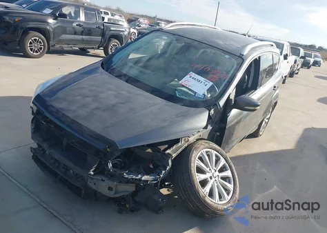 2017 Ford Escape Titanium z USA, uszkodzony, nr VIN 1FMCU0J96HUC13727